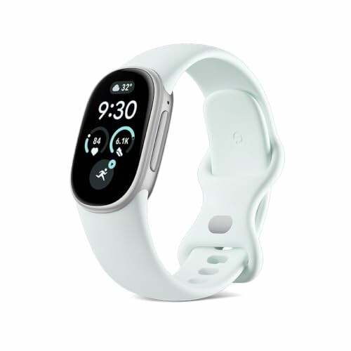 Fitbit Edge da Google: caixa prateada polida, bracelete desportiva cinzenta n&eacute;voa