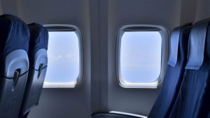 O truque secreto para conseguir um lugar à janela no avião sem pagar mais